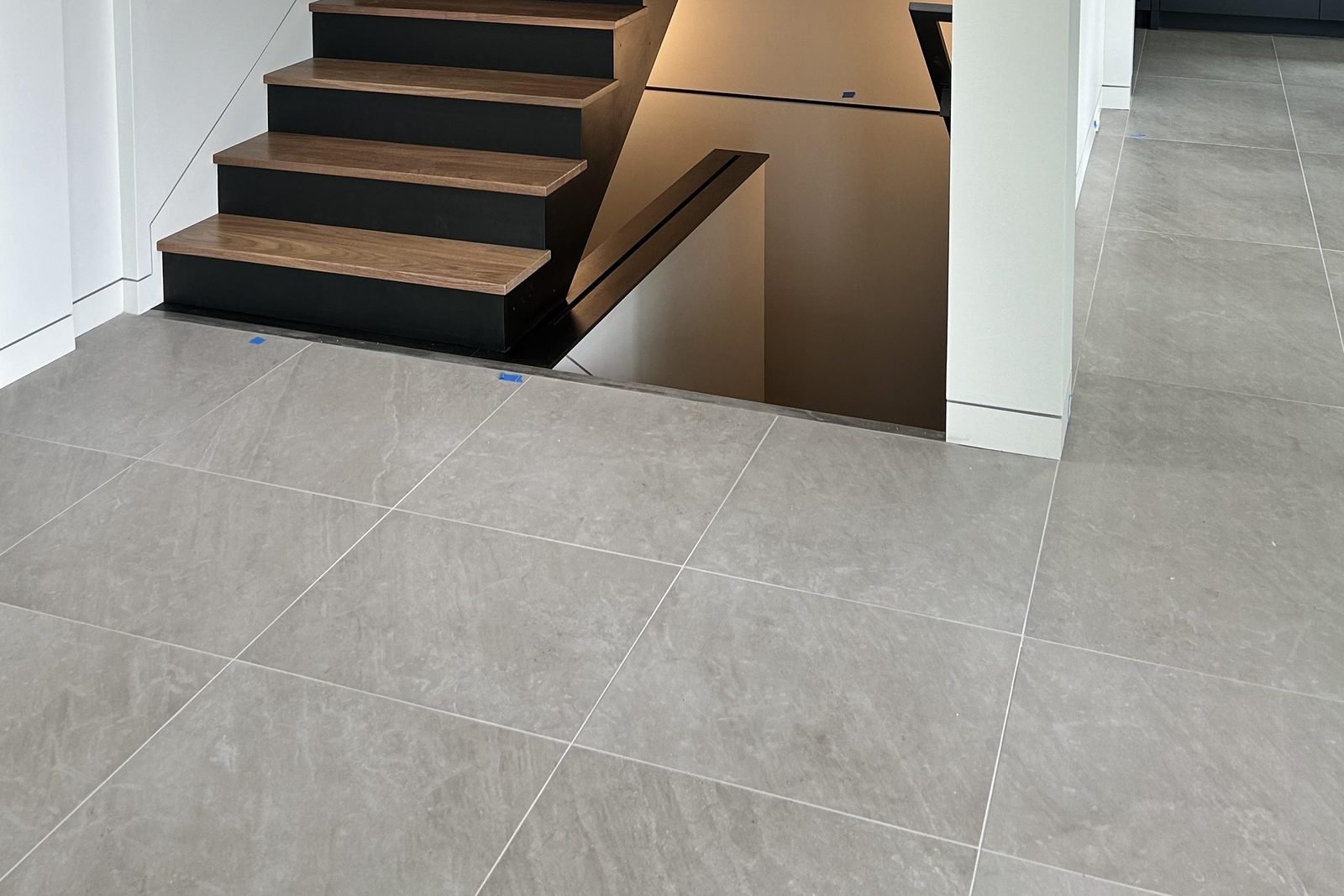 Large-format tile flooring installation